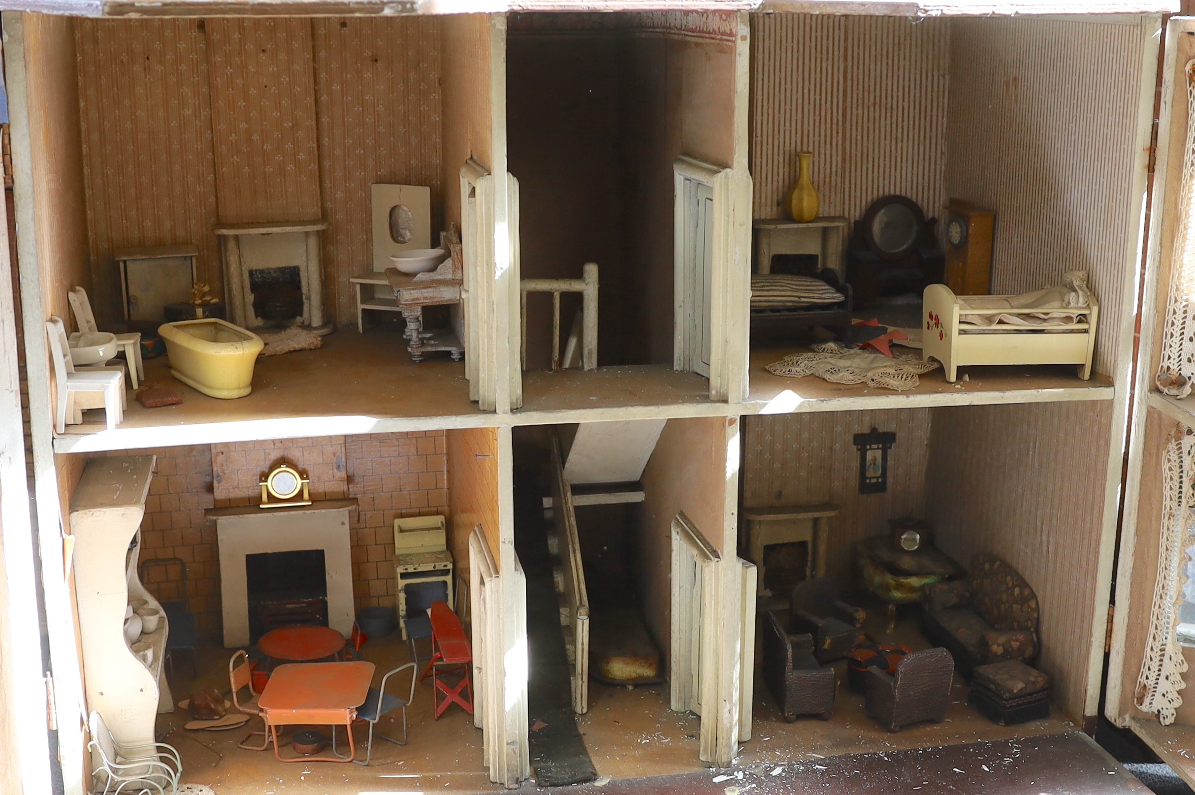 ‘Kits Coty House': An important G. & J. Lines furnished dolls’ house, dated 1912